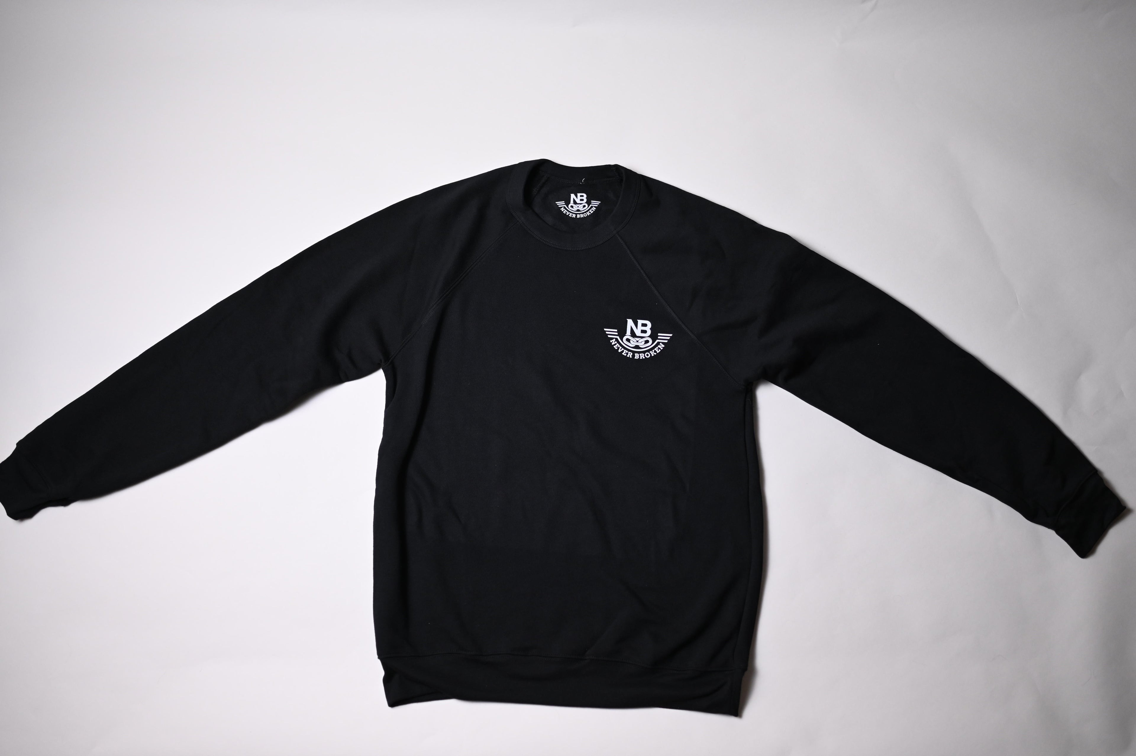Black sweatshirt with a logo on a white background