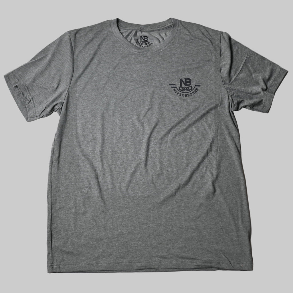 Gray t-shirt with a small logo on a white background
