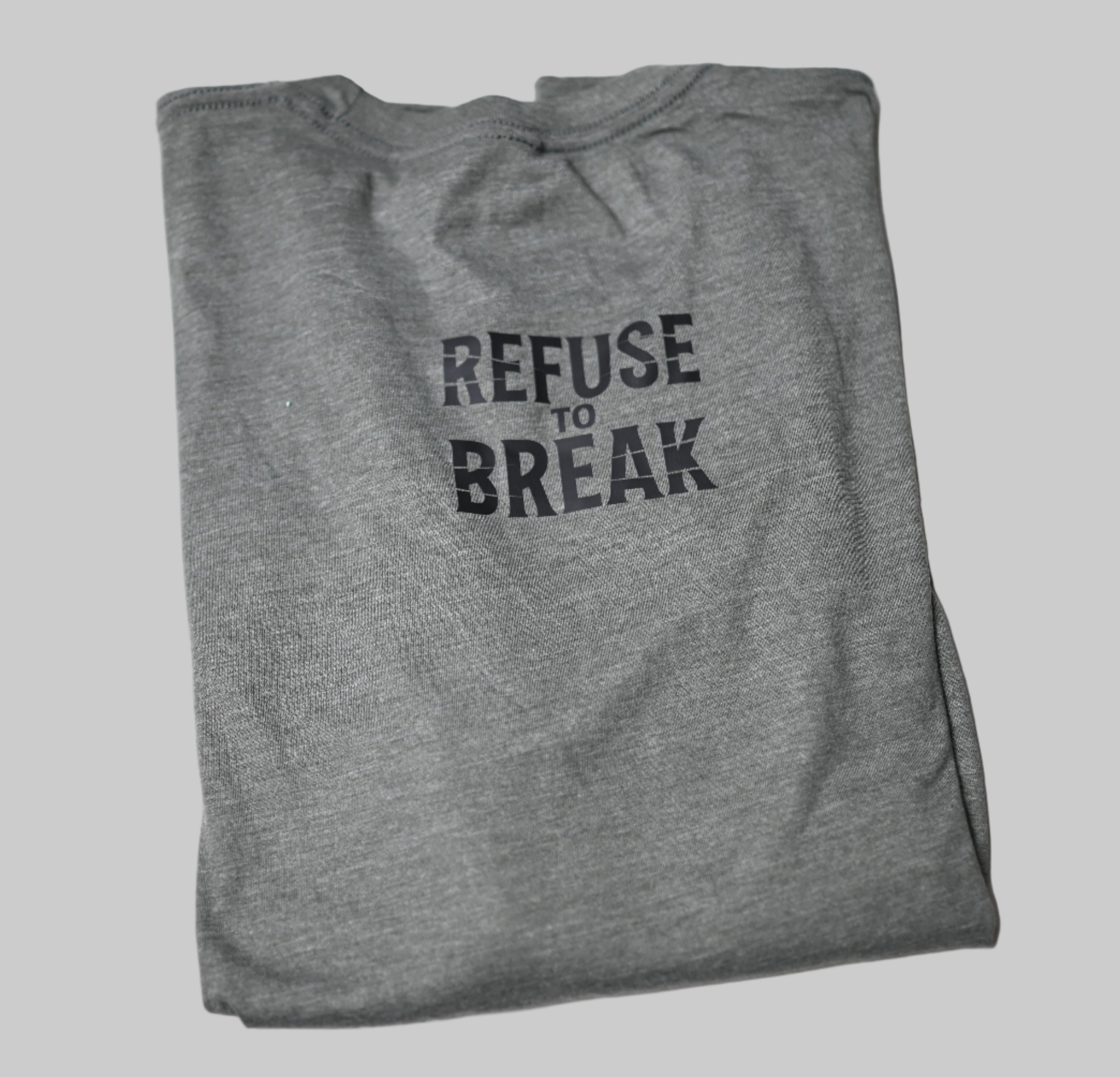 Folded gray sweatshirt with 'REFUSE to BREAK' text on a white background